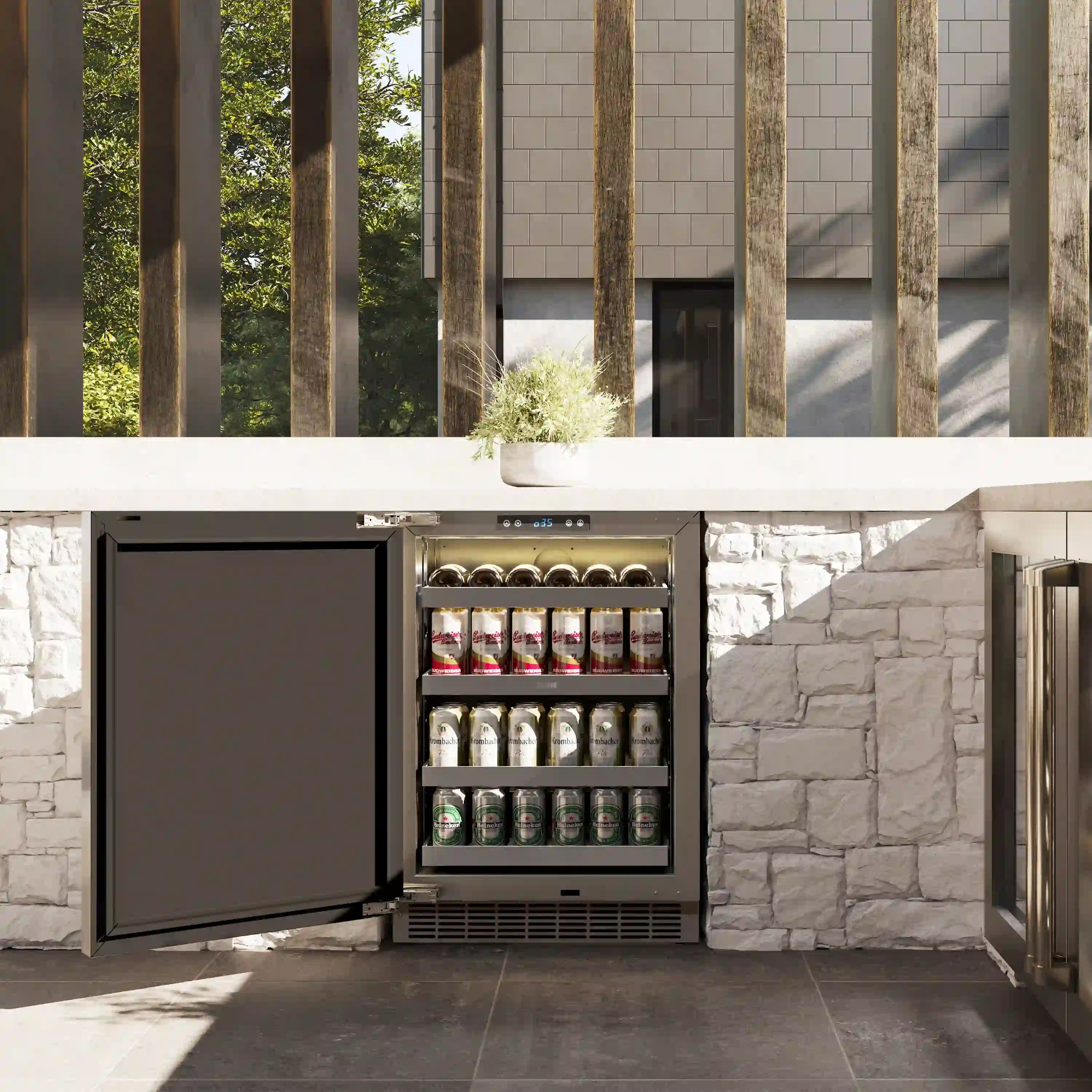 Built-in outdoor beverage fridge with open door and stocked shelves