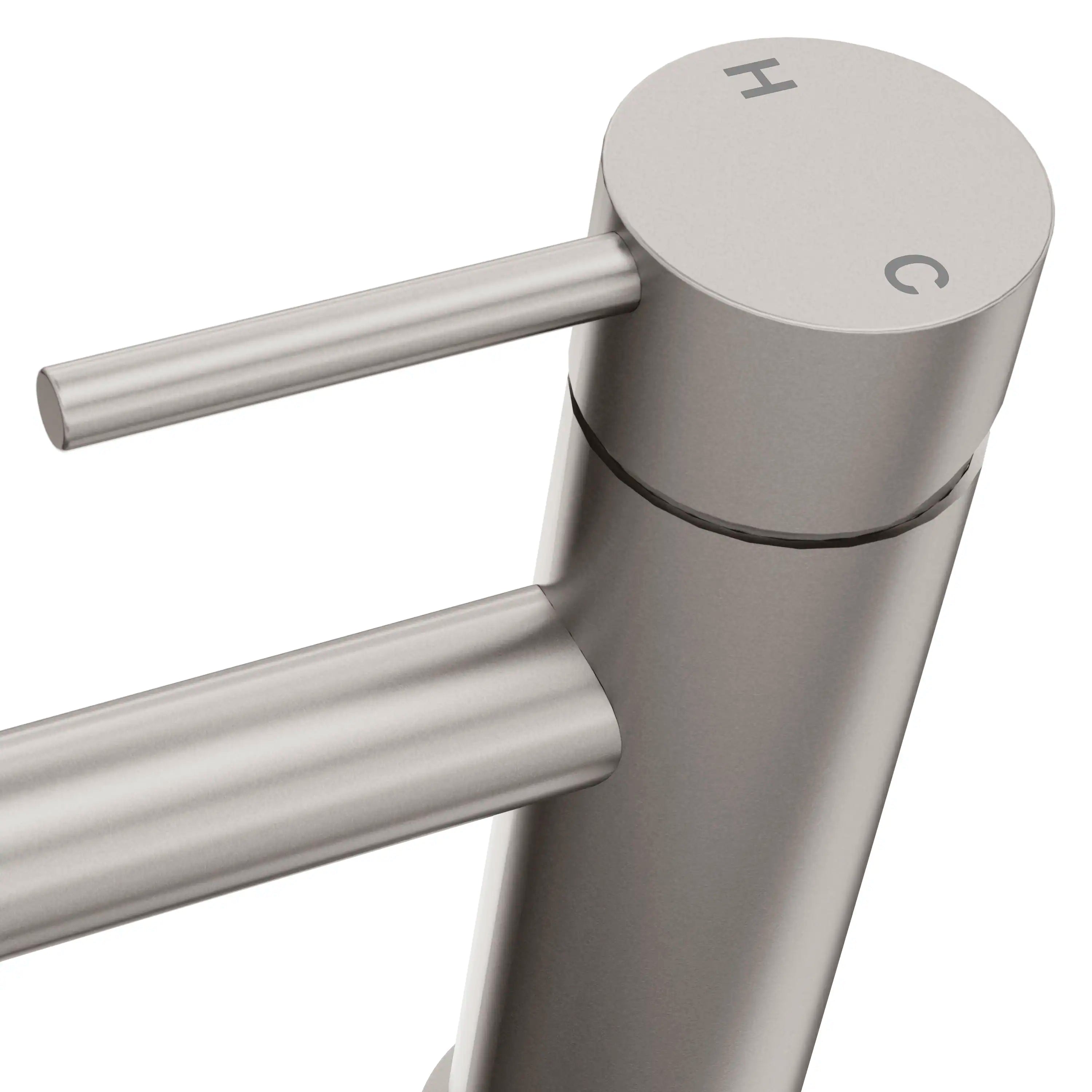 Close-up single-handle faucet top with lever handle, brushed nickel finish