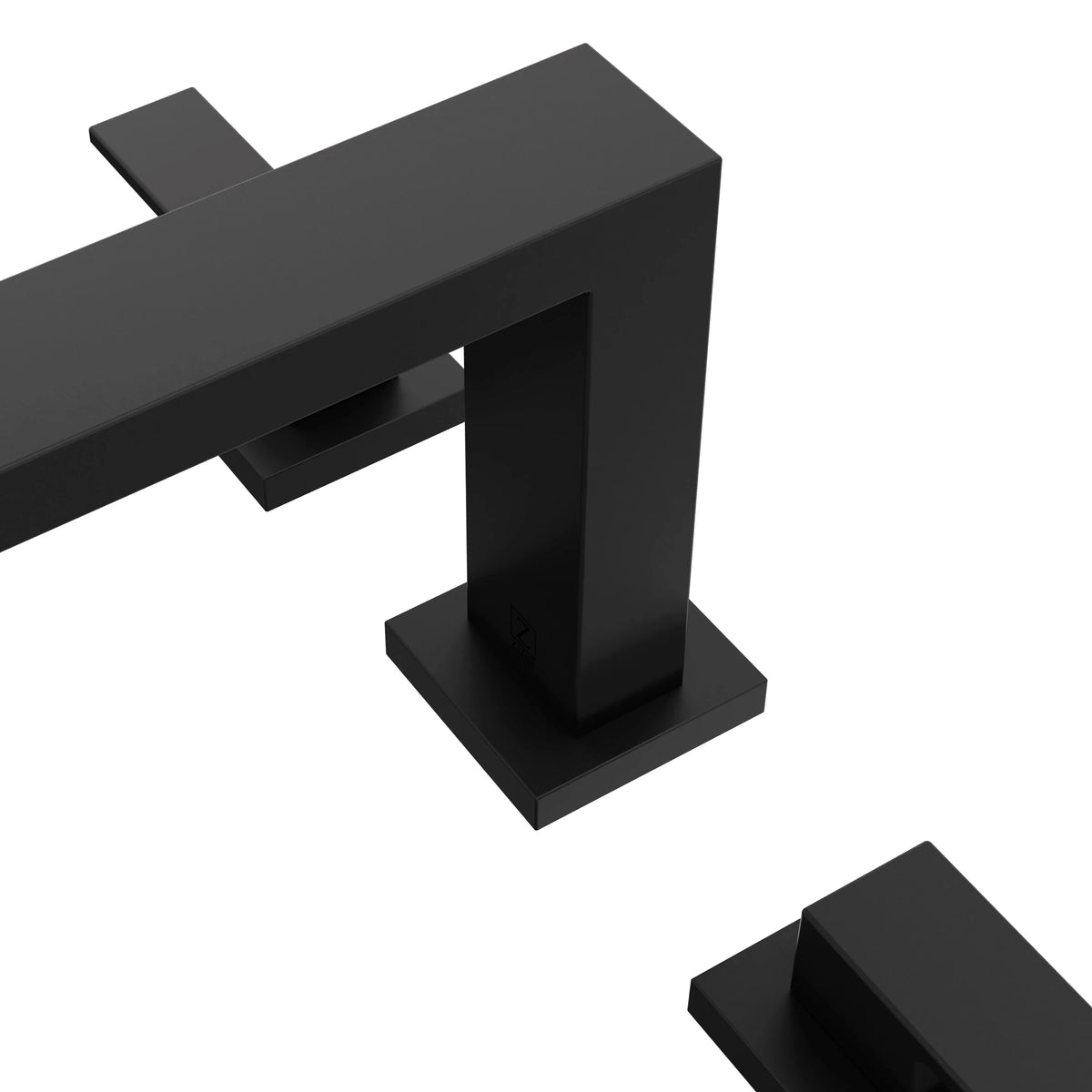 Close-up of matte black faucet spout and handle on a square base