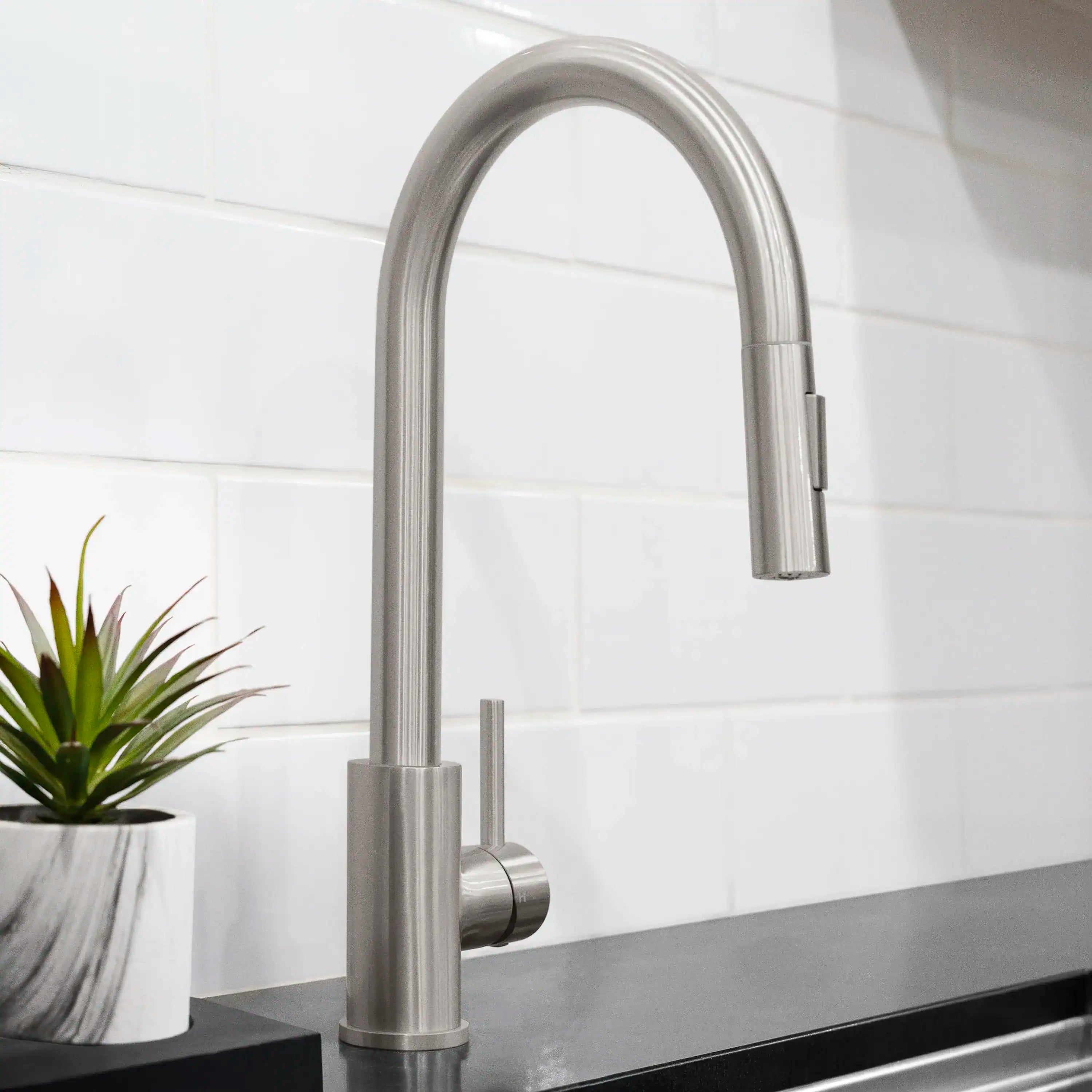 Brushed nickel kitchen faucet with single handle and pull-down sprayer head
