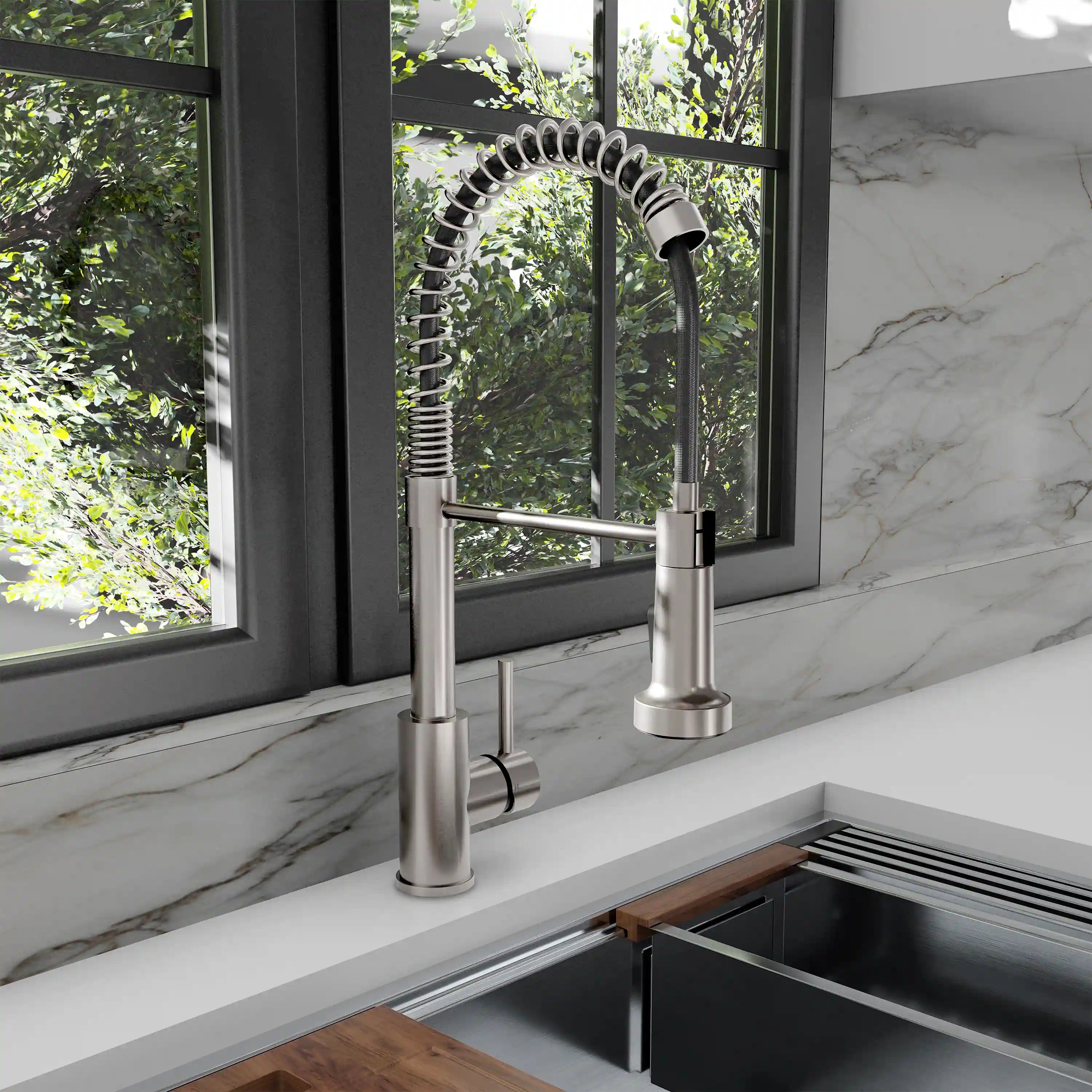 Brushed nickel kitchen faucet with pull-down spring wand