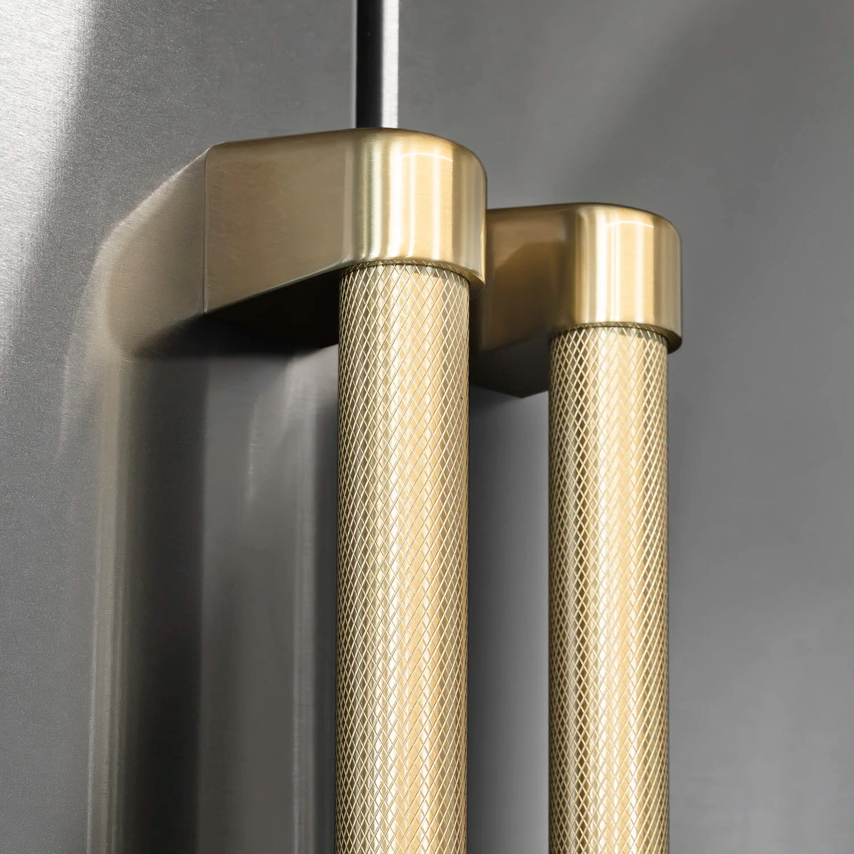 Stainless French door refrigerator with bronze helix handle and vertical door edge