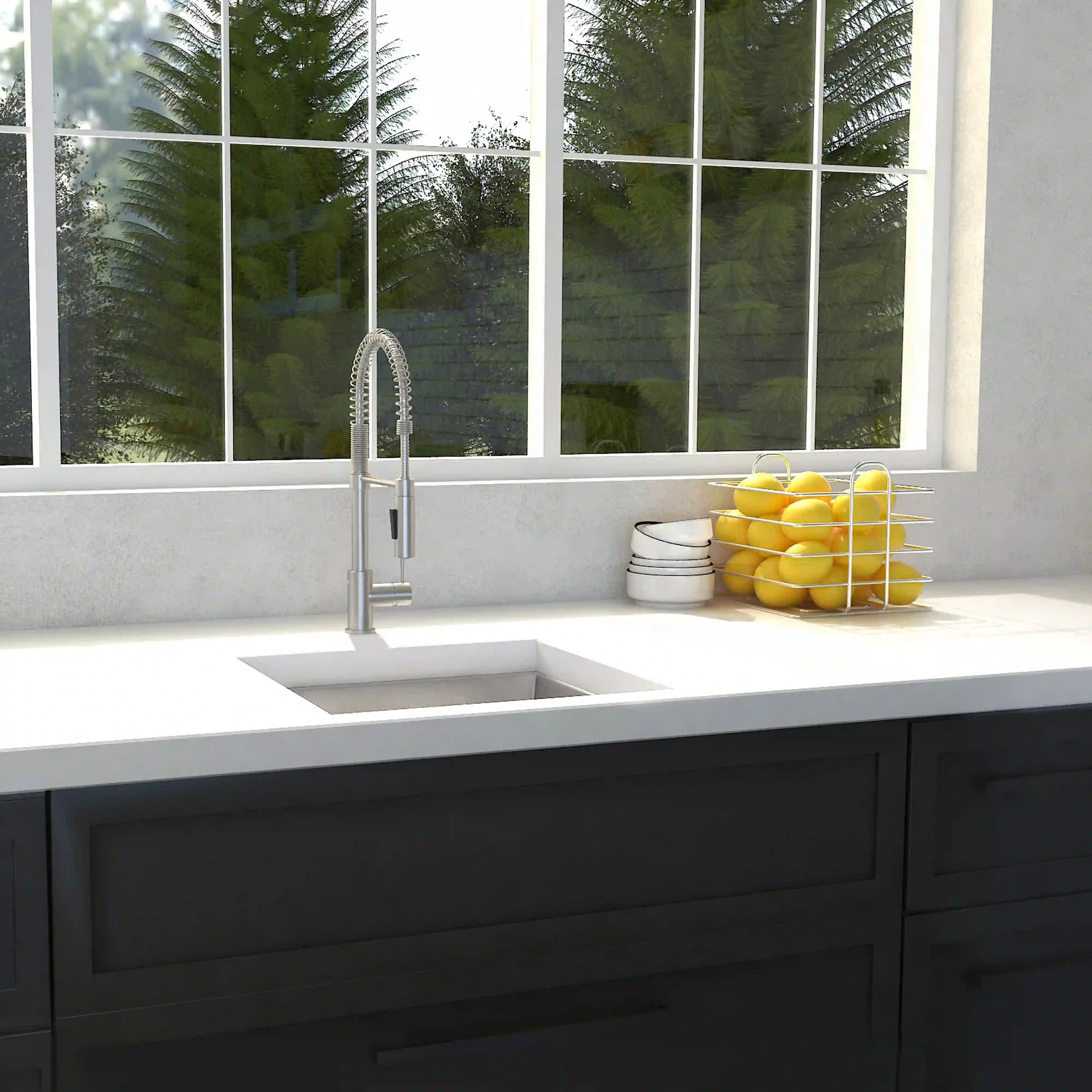 Stainless steel undermount single-bowl kitchen sink installed in a countertop with faucet.