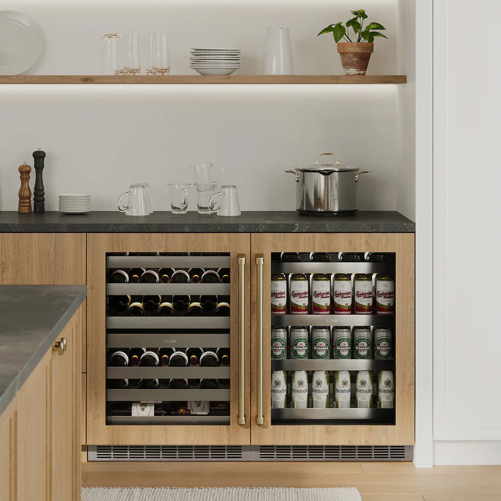 Built-in beverage fridge installed in cabinet with front grille and open door shelves