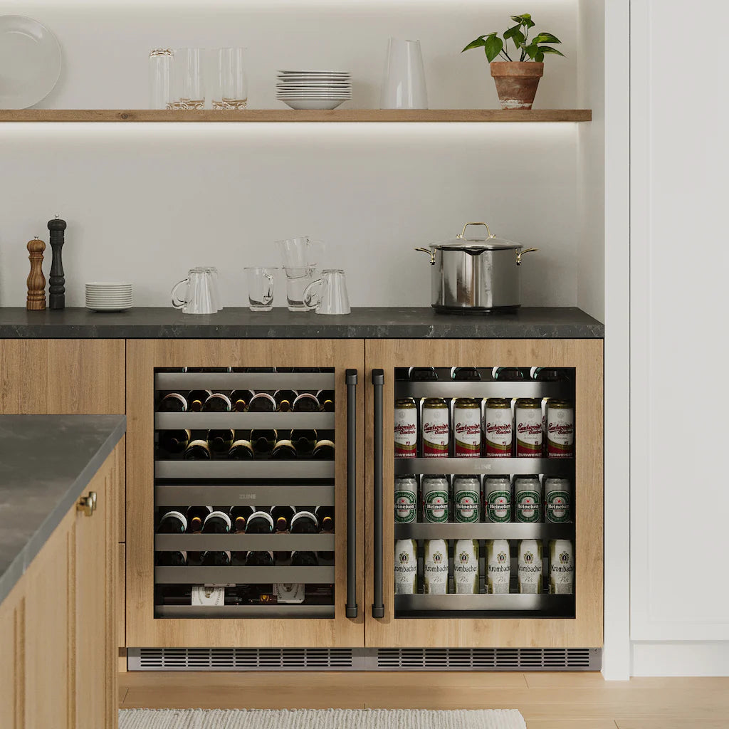 Outdoor wine cooler installed in cabinetry, doors open with wine bottles inside