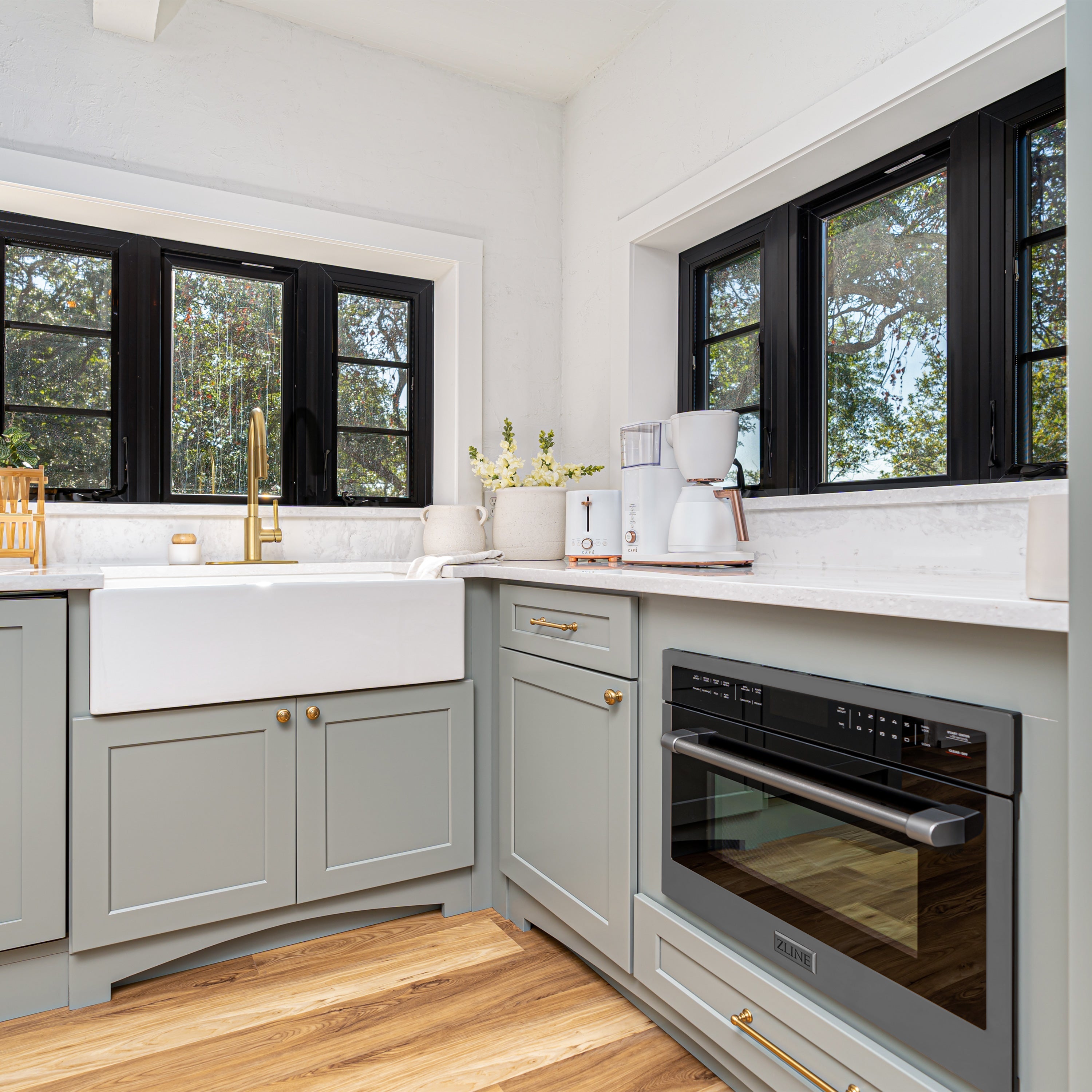 Built-in black oven with glass door in kitchen cabinetry