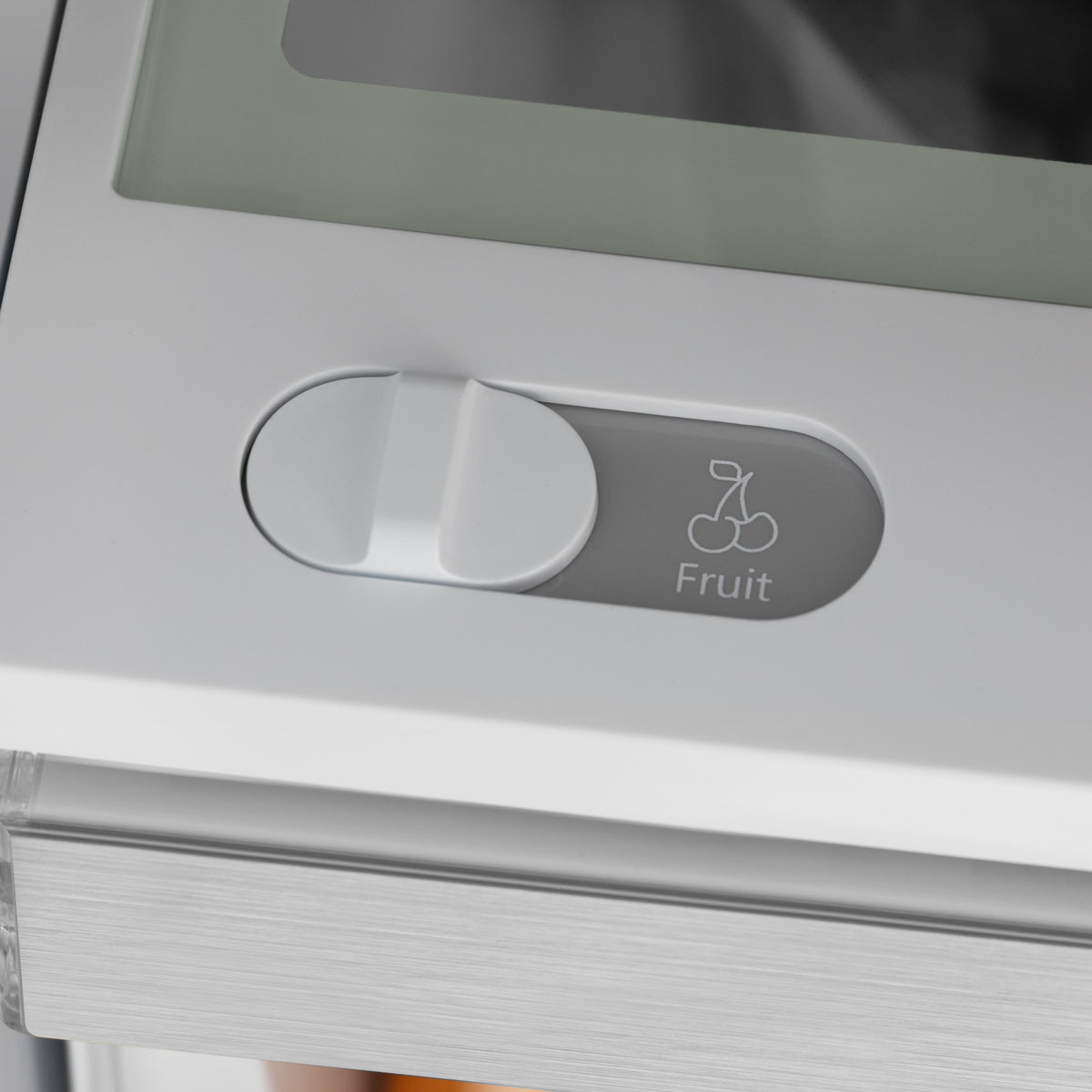 Refrigerator drawer bin labeled "Fruit" with transparent cover and gray label