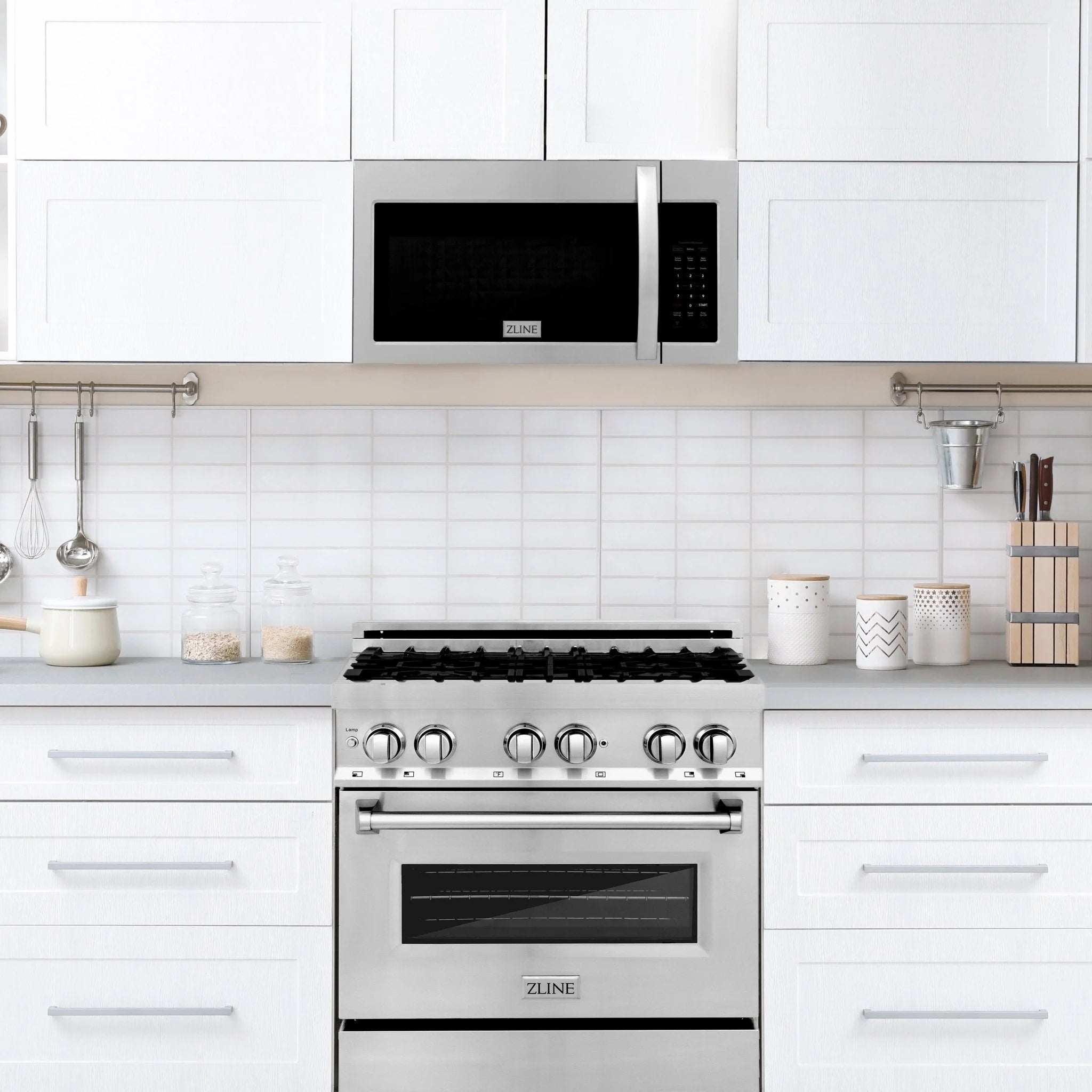 Built-in over-the-range microwave above cooktop with black glass door