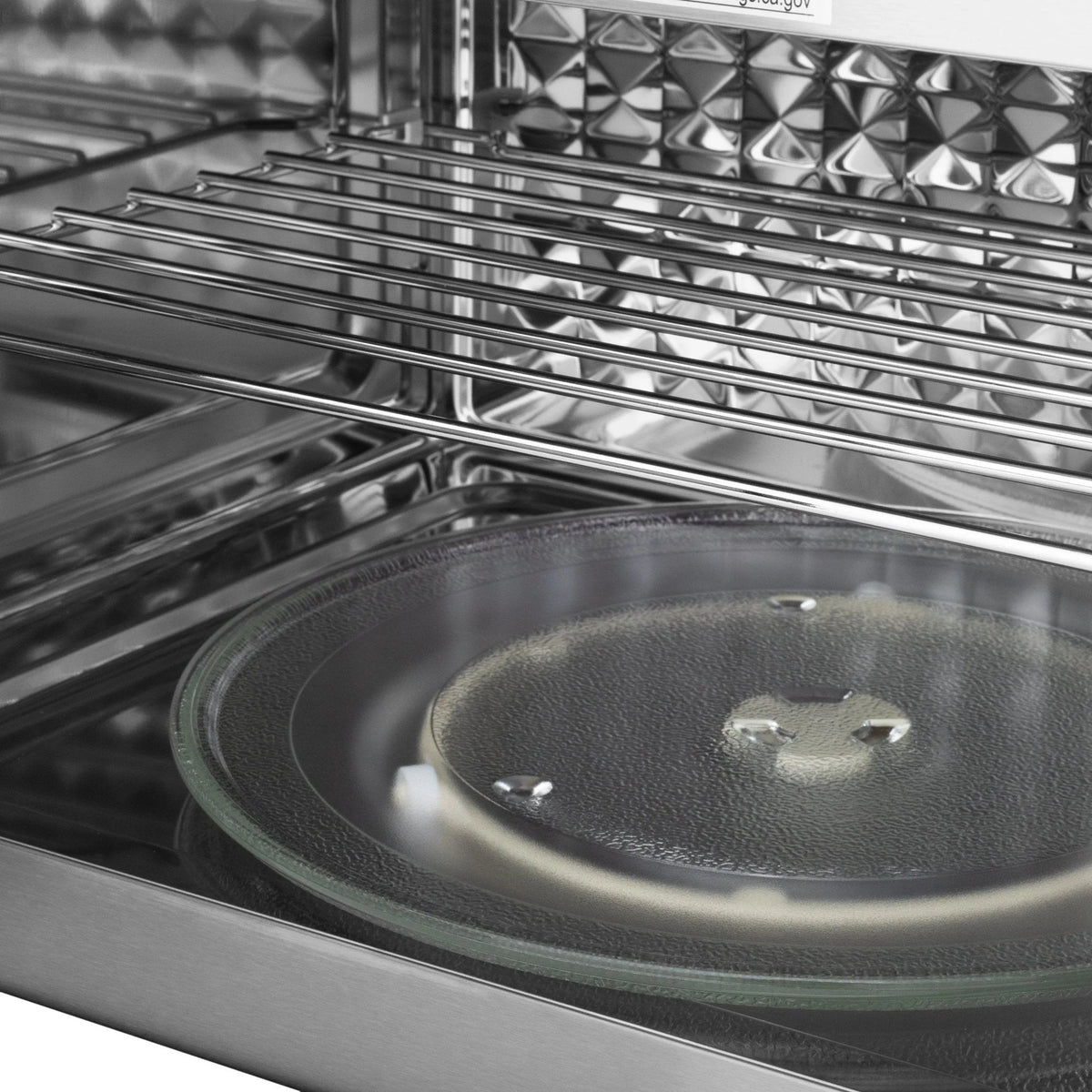 Over-the-range microwave interior with glass turntable and stainless cavity