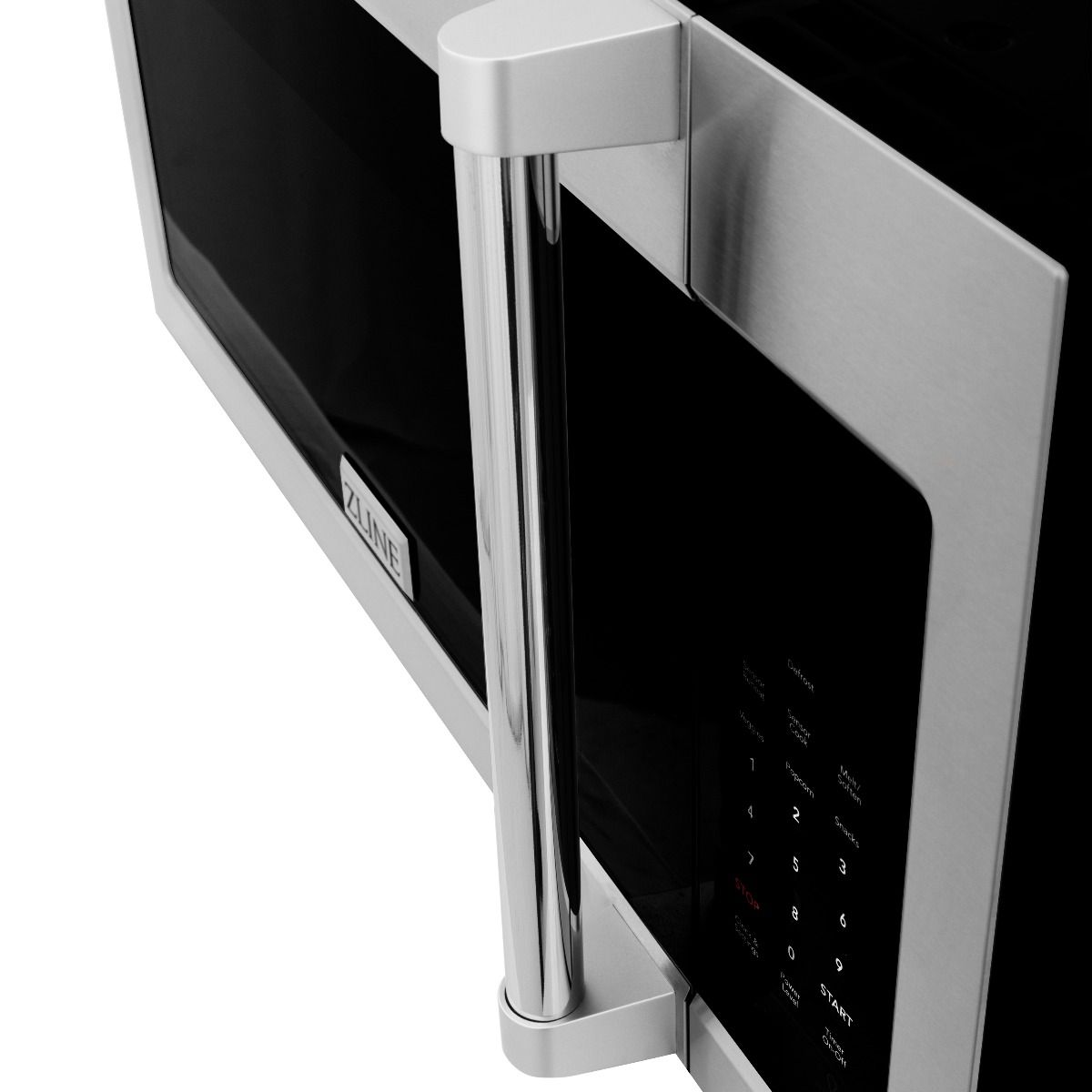 Over-the-range microwave oven side view with stainless handle and keypad