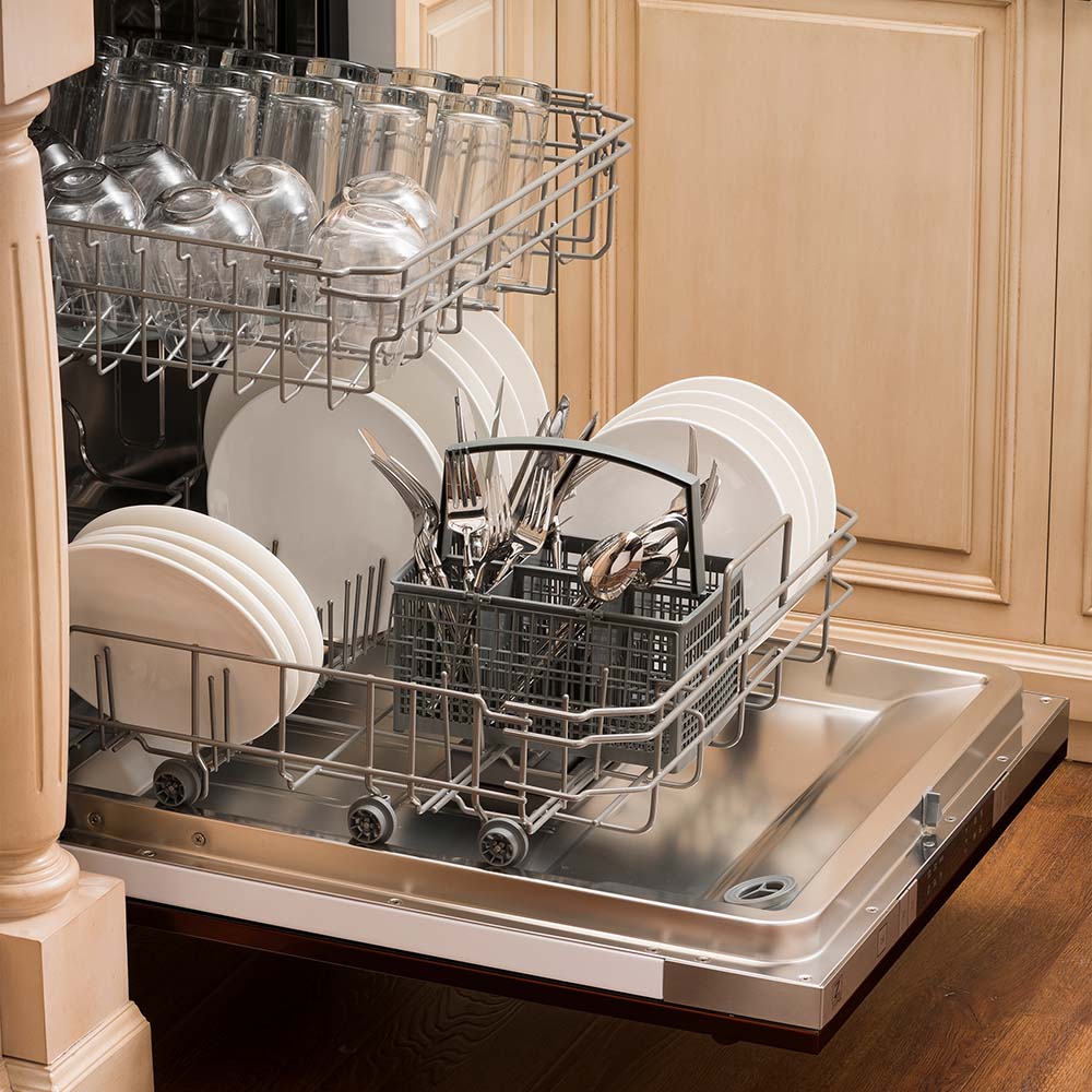 24-inch dishwasher with fully loaded racks and stainless tub installed under counter