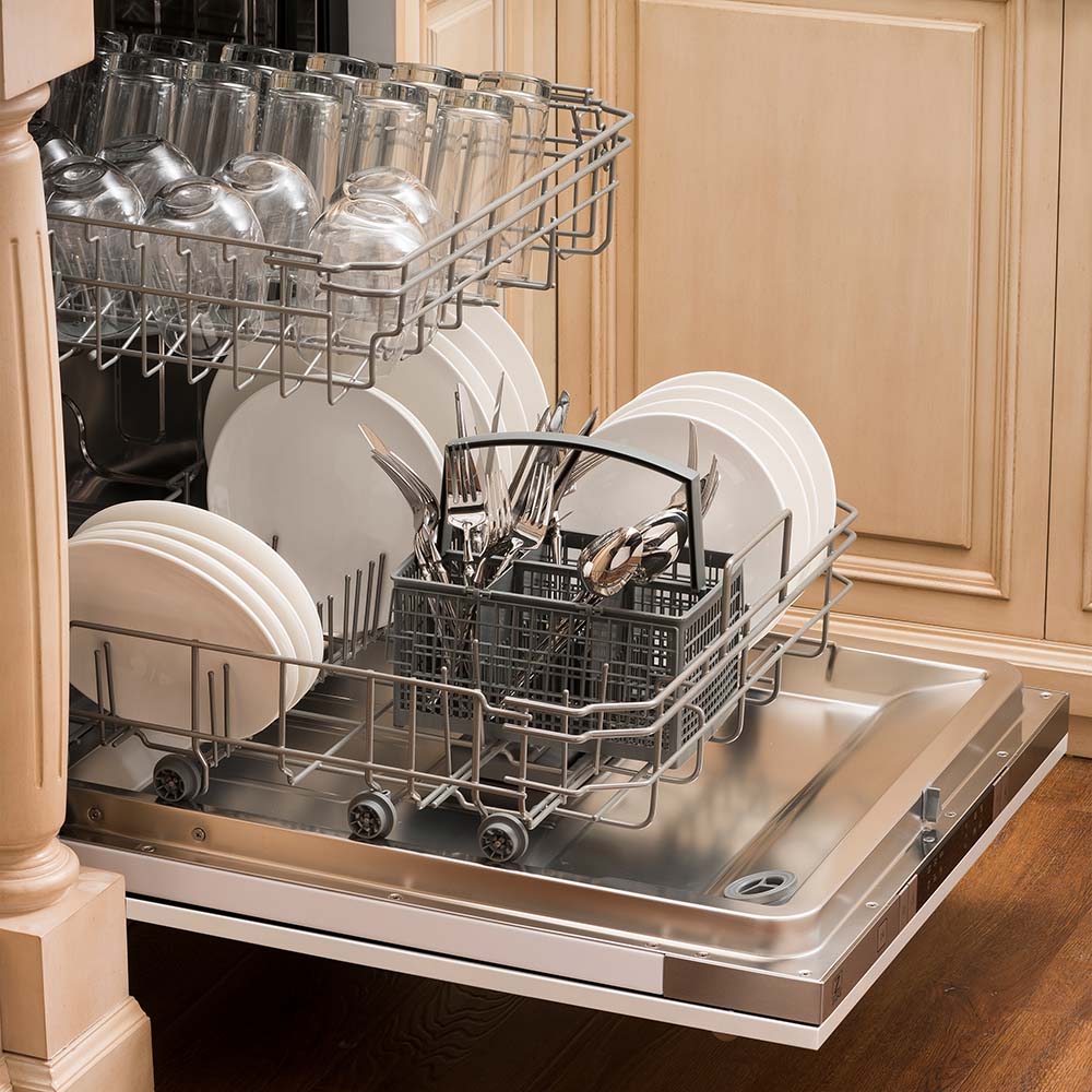 Open dishwasher with dishes on racks and stainless tub base
