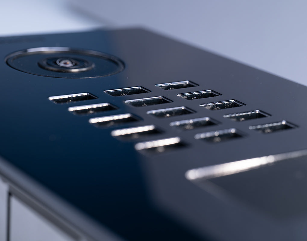 DoorBird video door station keypad with multiple square call button openings