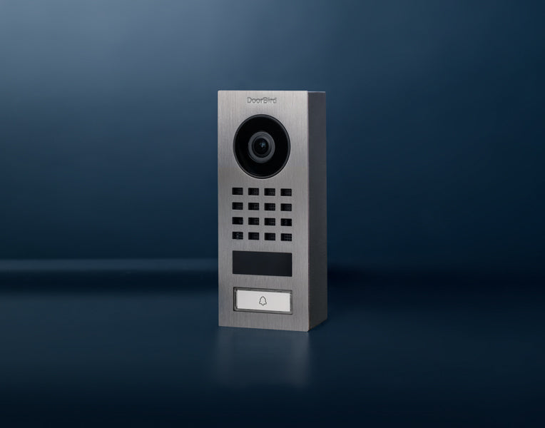Stainless steel video door intercom front view on a dark surface