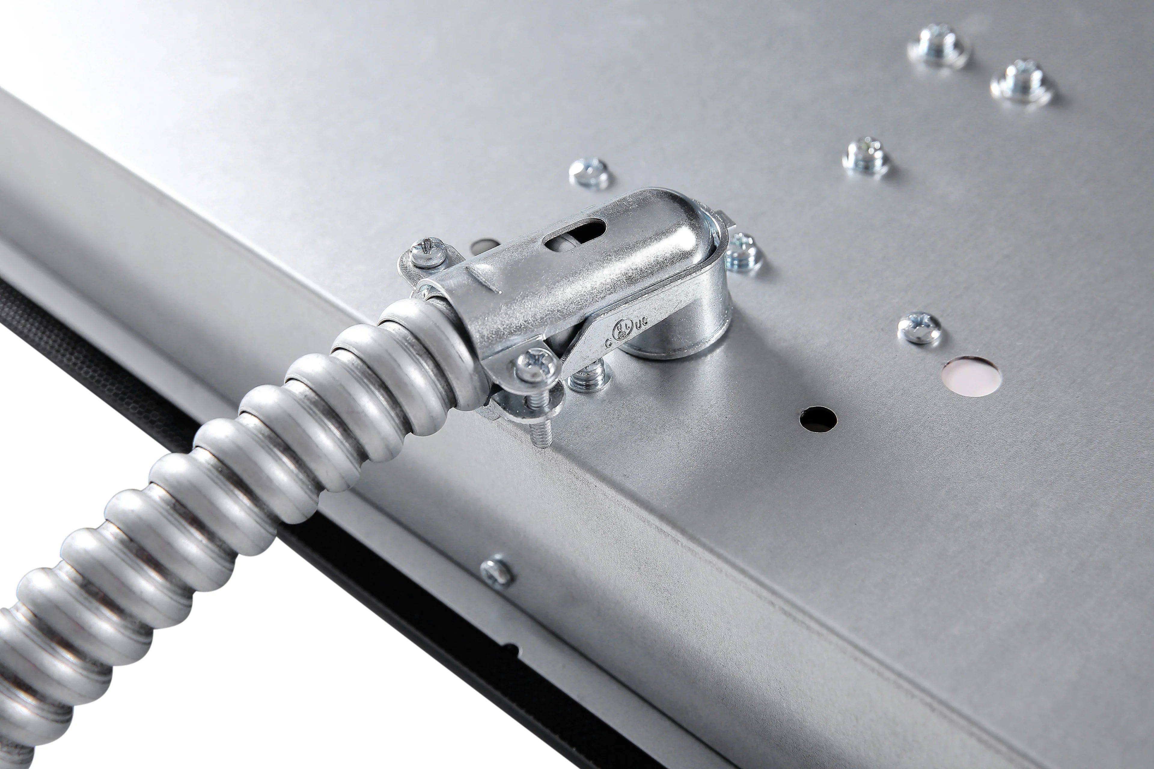 Stainless mounting bracket and power connector on induction cooktop underside
