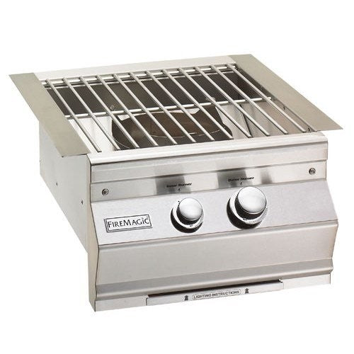 Stainless built-in power burner with porcelain cast iron cooking grid and control knobs