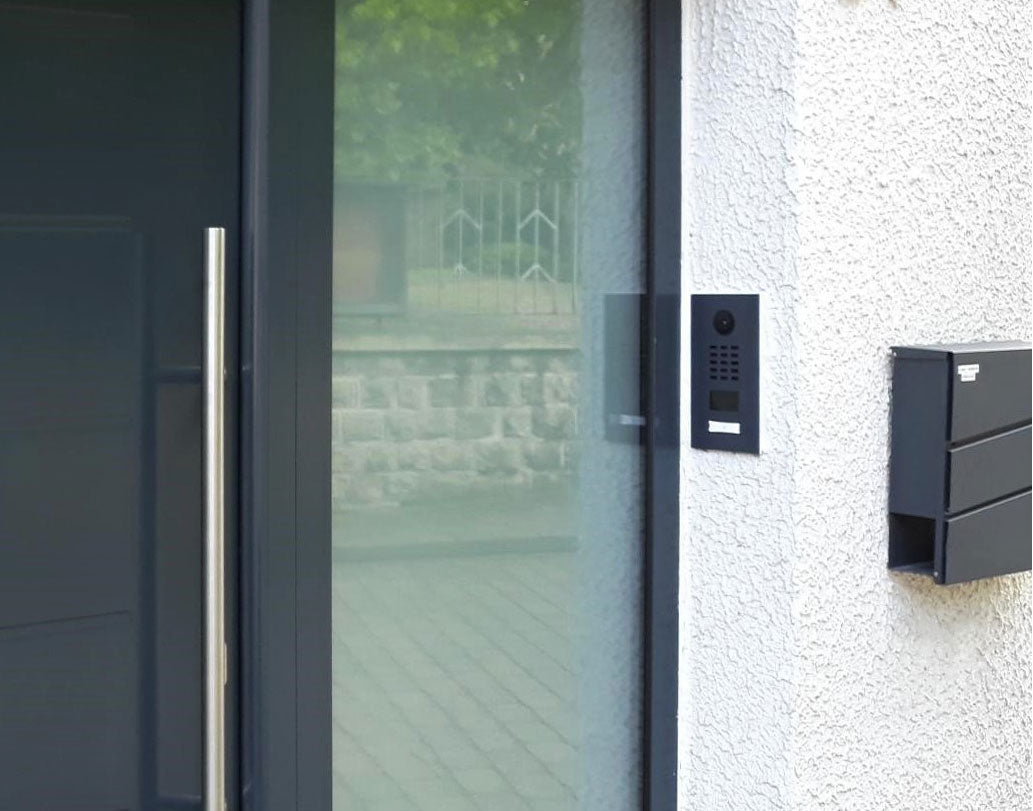 Anthracite grey video door station with call button and keypad panel