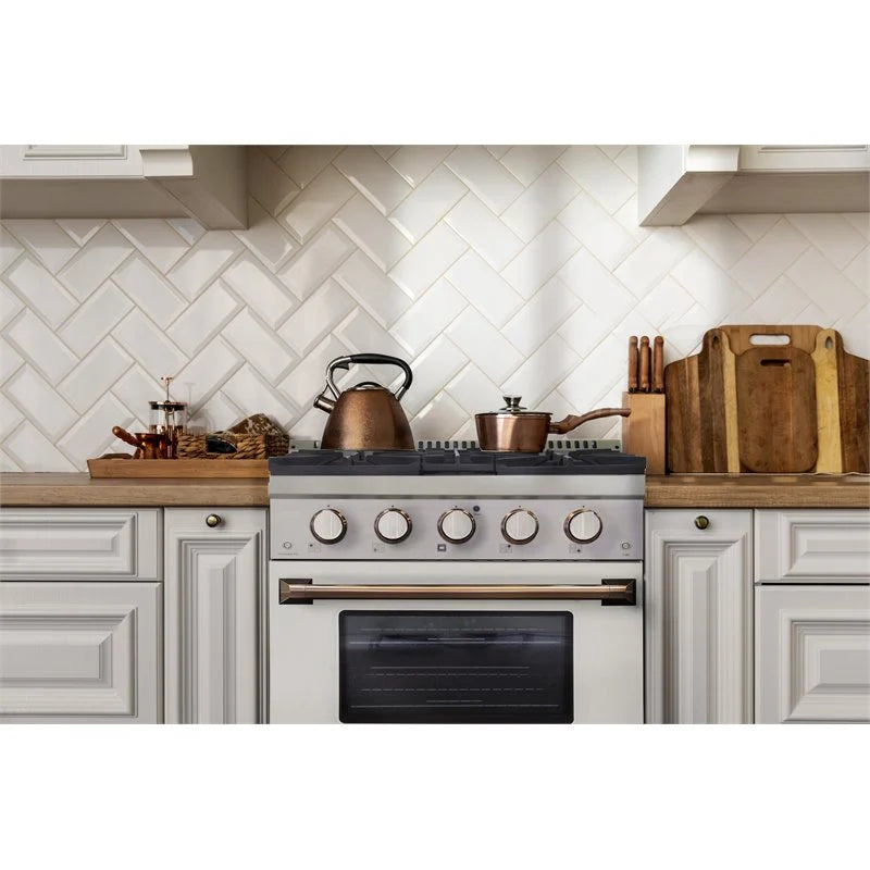 White gas range with gold handle and five burners, oven door with dark window