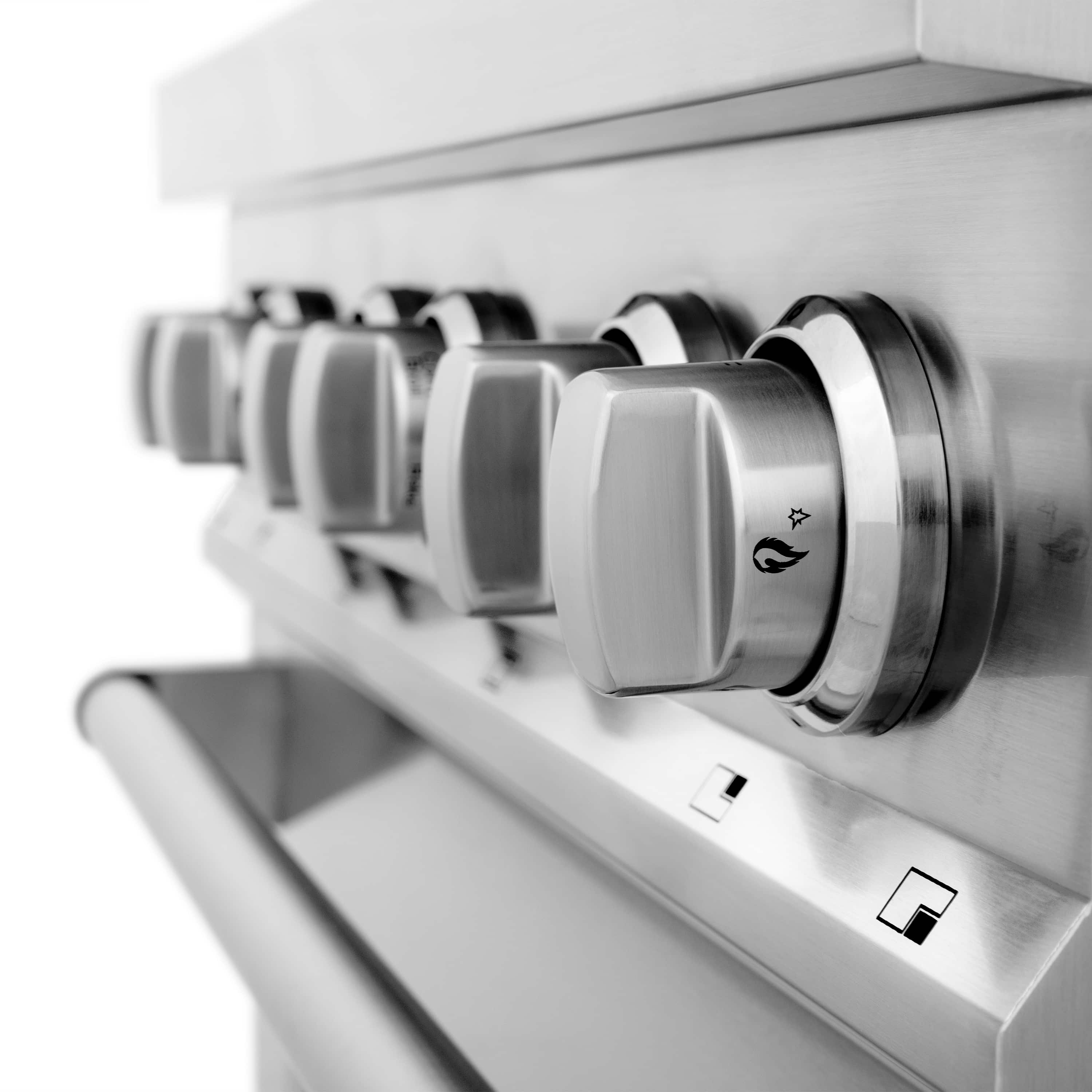 ZLINE dual fuel range control knobs and stainless steel cooktop panel close-up