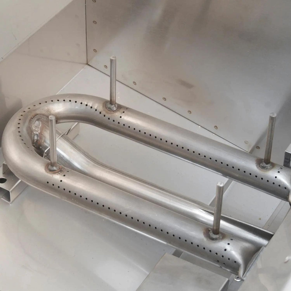 Stainless gas burner tubes with mounted ignition components