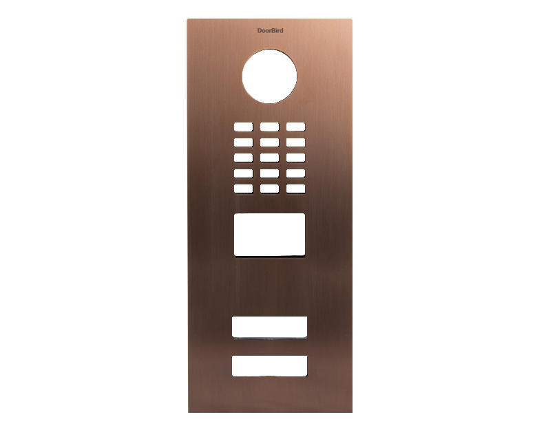 DoorBird bronze front panel with circular lens cutout and button layout