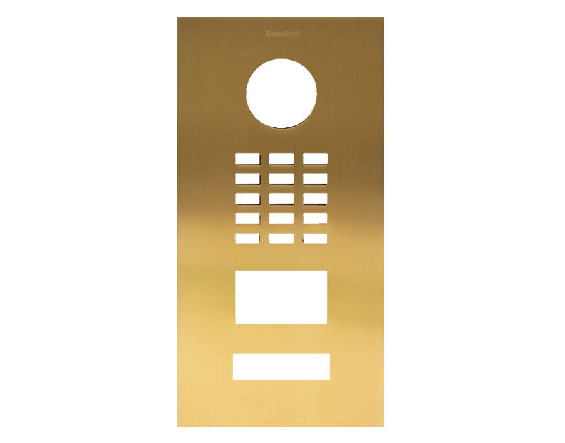 Gold metal DoorBird front panel with circular lens hole, grille, and button layout