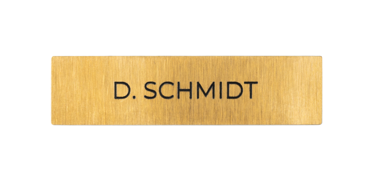 DoorBird gold nameplate with engraved "D. SCHMIDT" for one call button
