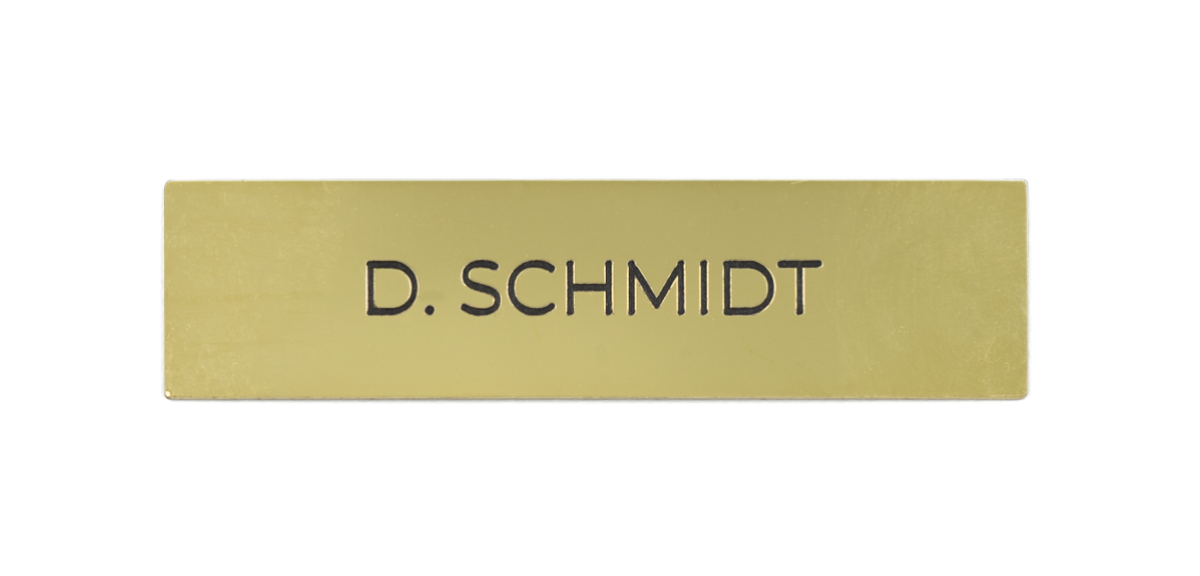 Brass nameplate with engraved text "D. SCHMIOT"