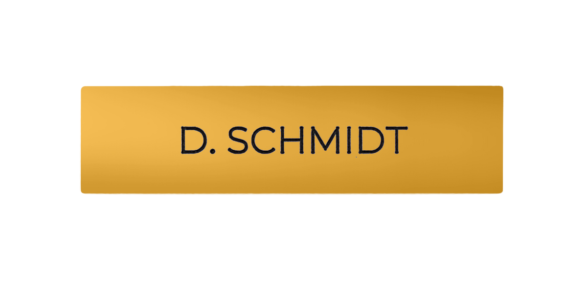 Signal yellow engraved nameplate with “D. SCHMIDT” text