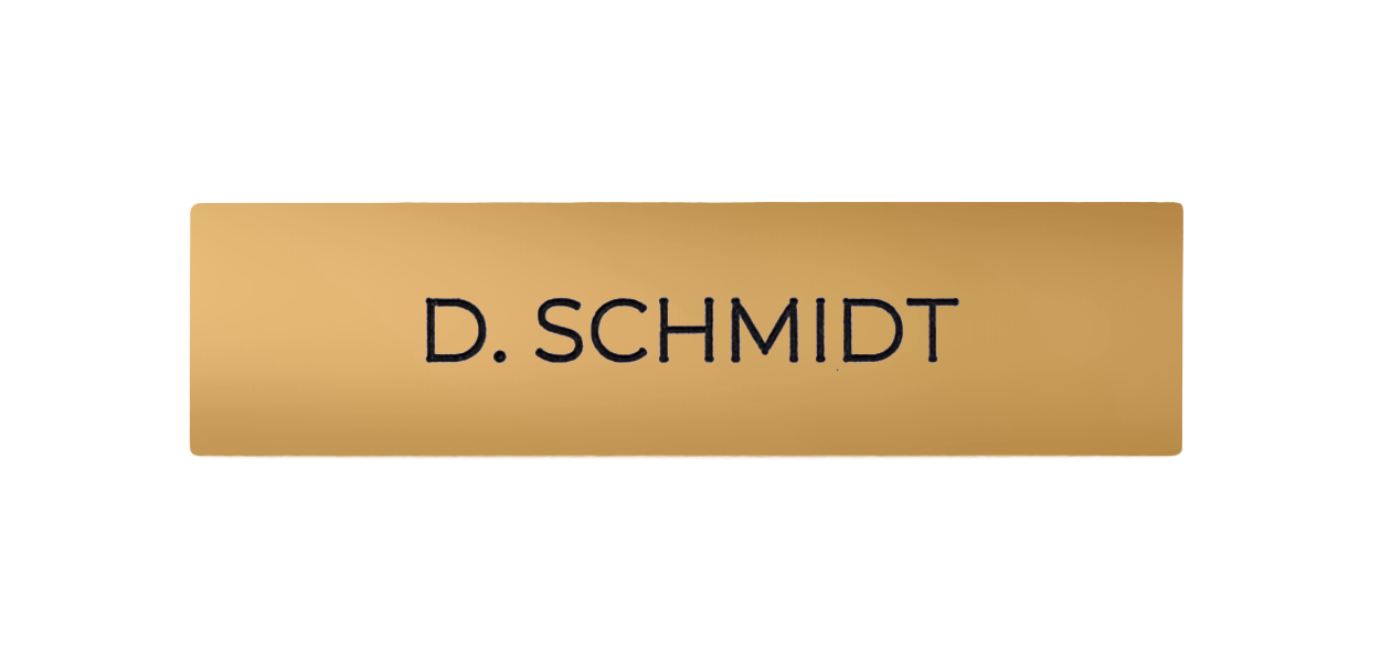 Saffron yellow engraved nameplate with “D. SCHMIDT” text