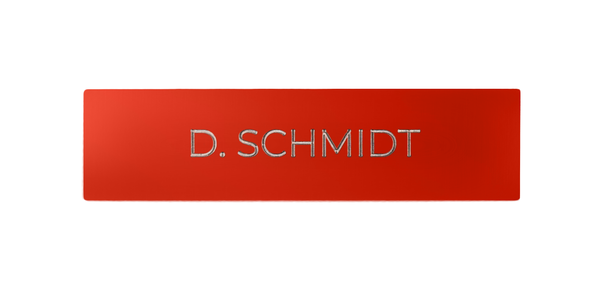 Flame red engraved nameplate reading “D. SCHMIDT”