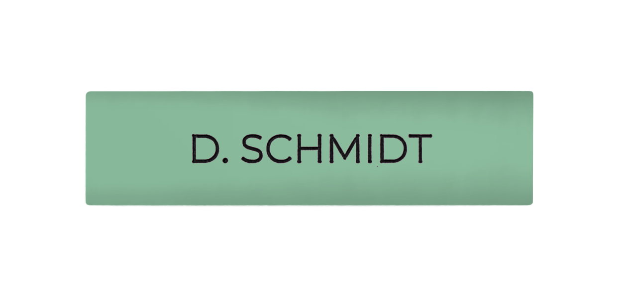 Pastel green engraved nameplate reading 'D. SCHMIDT'