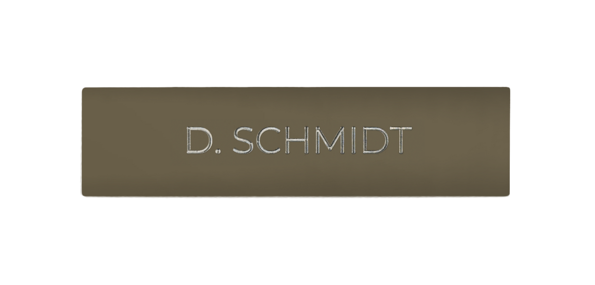 Beige-grey door nameplate with engraved text "D. SCHMIDT"