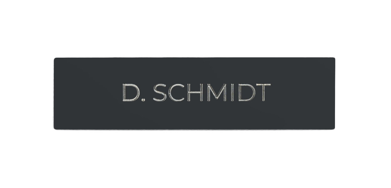 Slate grey doorbell nameplate with engraved “D.SCHMIDT”