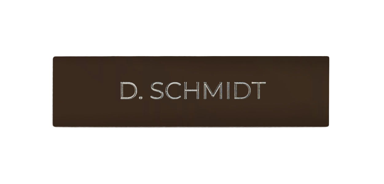 Terra brown nameplate with engraved text: D. SCHMIDT