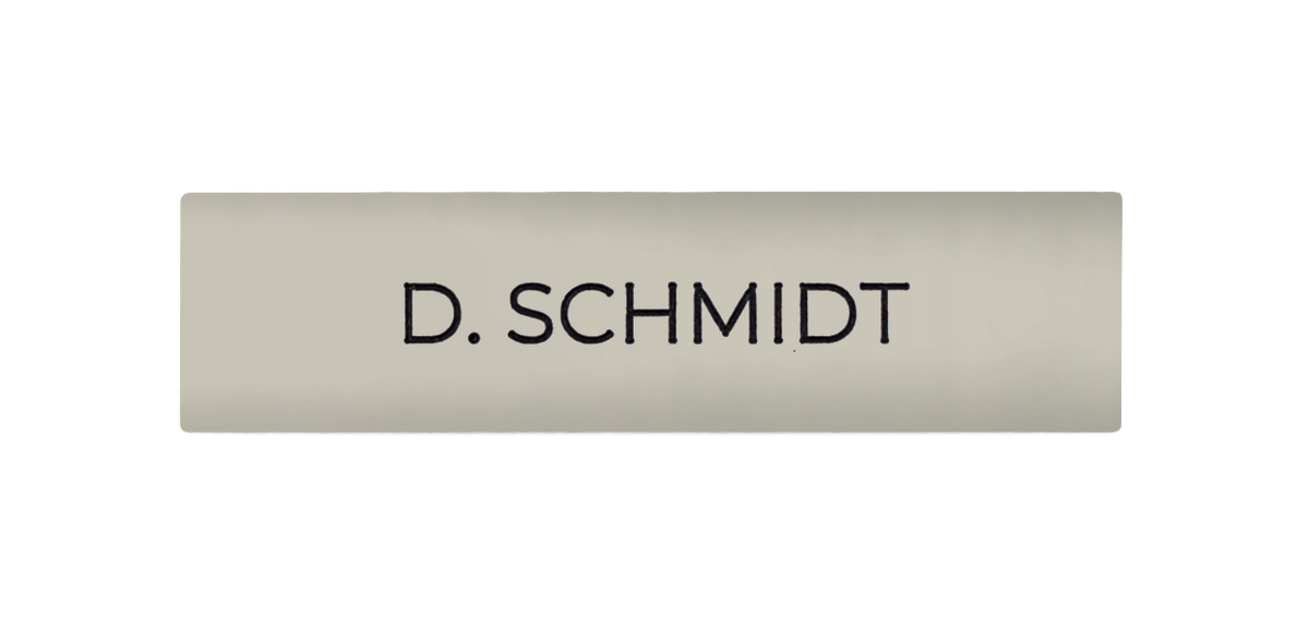 Grey-white nameplate with 'D. SCHMIDT' engraving