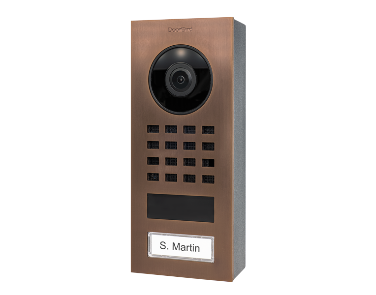 DoorBird D1101V bronze surface-mount video intercom with call button and camera lens