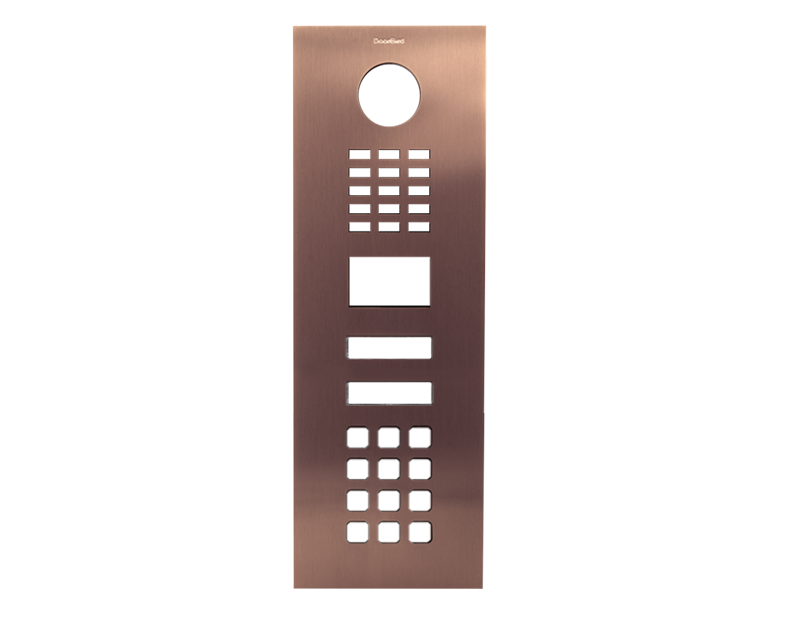 Bronze DoorBird front panel with circular lens cutout, button grid and speaker opening