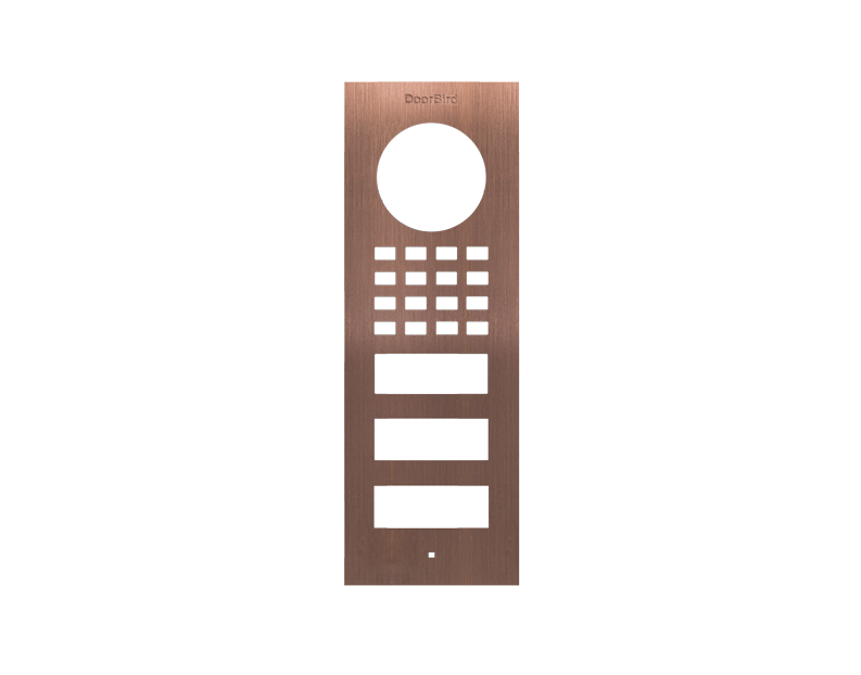 Bronze DoorBird surface-mount front panel with circular camera cutout and keypad