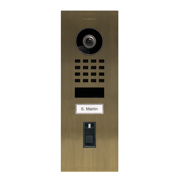 Brass flush-mount video door station with camera, keypad grid, and nameplate S. Martin