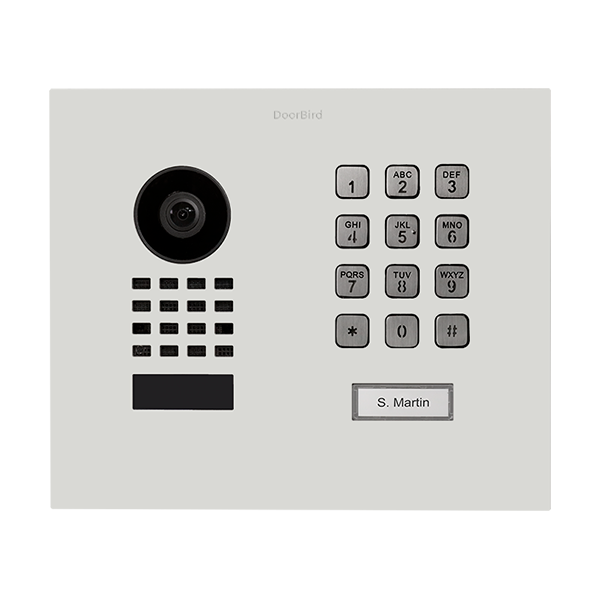 DoorBird flush-mount IP video door station in traffic white, with camera lens and keypad