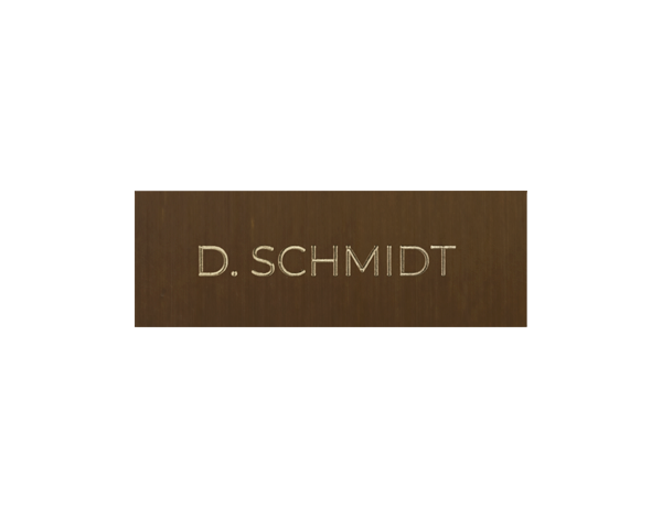 Architectural bronze nameplate with engraved text D. SCHMIDT