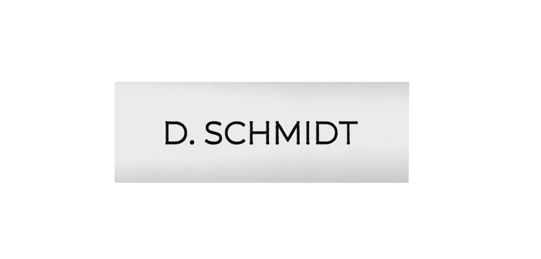 DoorBird engraved nameplate in traffic white with 'D. SCHMIDT' text