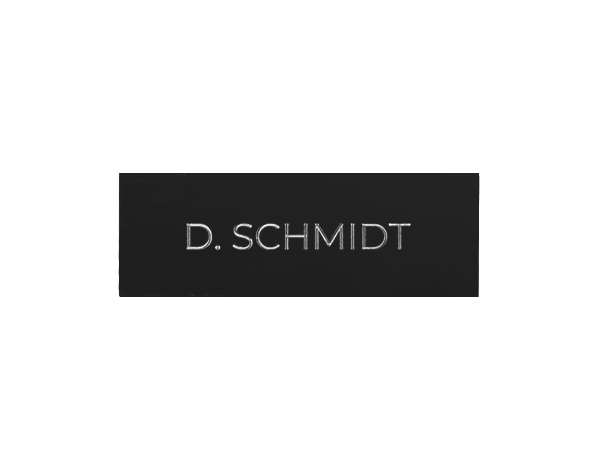 Graphite black engraved nameplate reading “D. SCHMIDT” for DoorBird call button