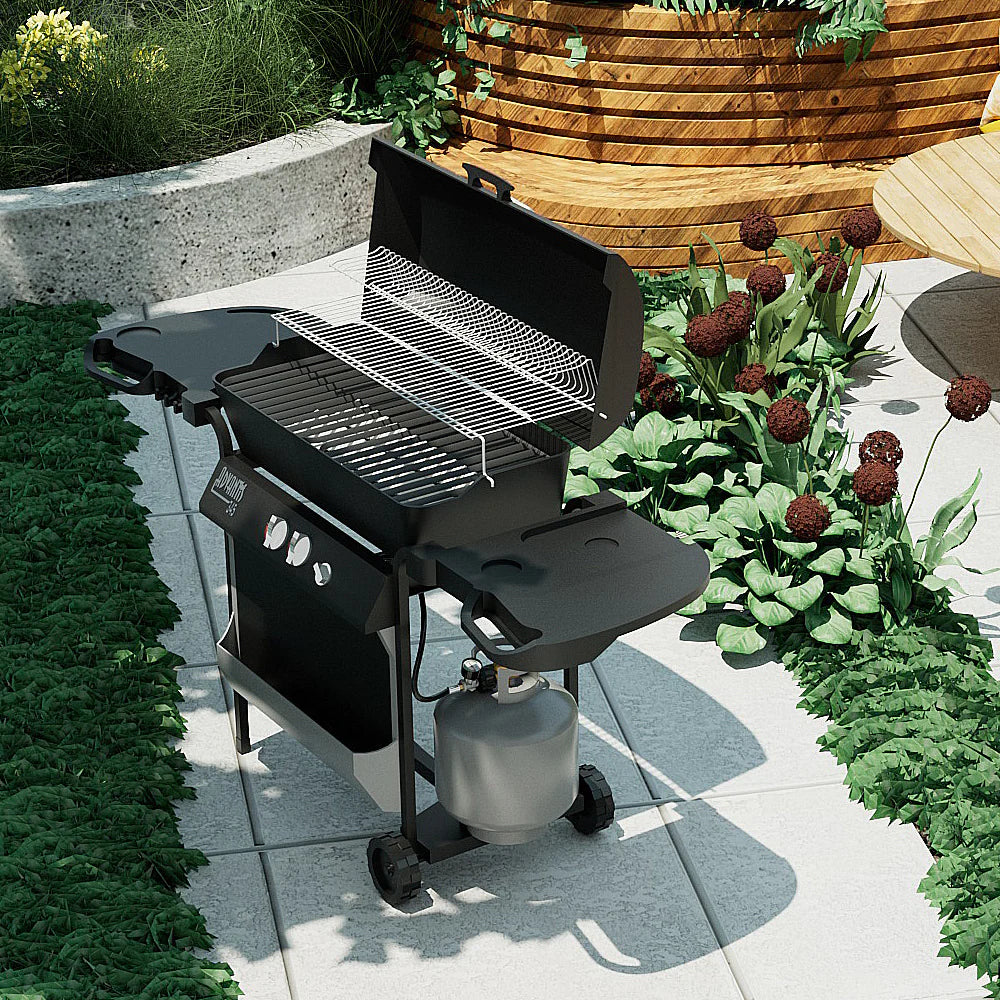 Outdoor black propane grill with gas tank and hose connection by the burner area