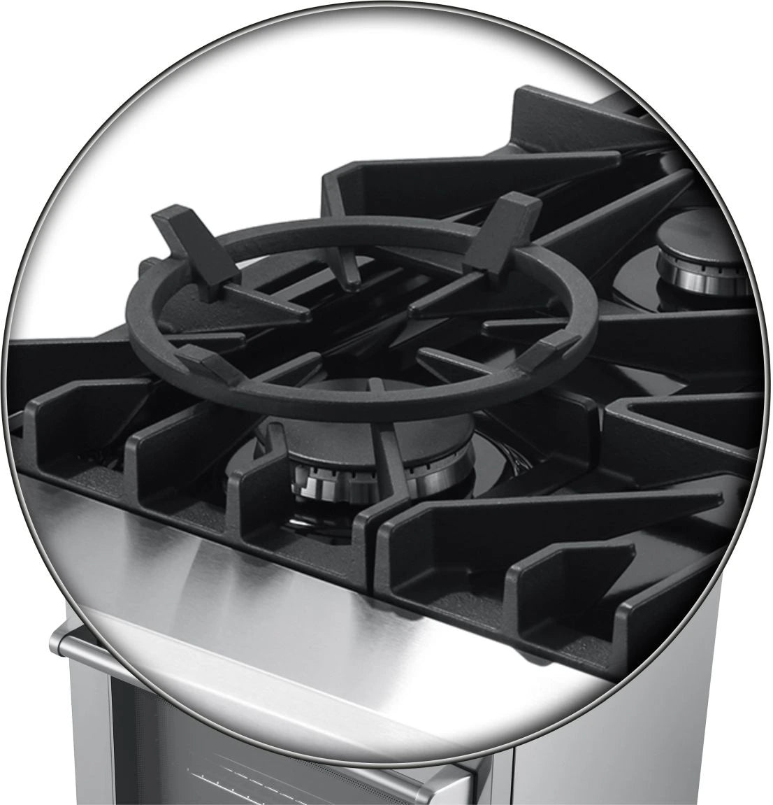 Stainless steel gas cooktop burner with black grates and circular ignition ring