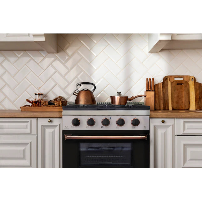 Stainless pro-style dual fuel range with black oven door and copper-ring burner knobs