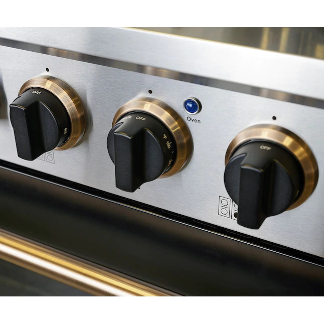 Stainless range control panel with black knobs and gold-ring settings