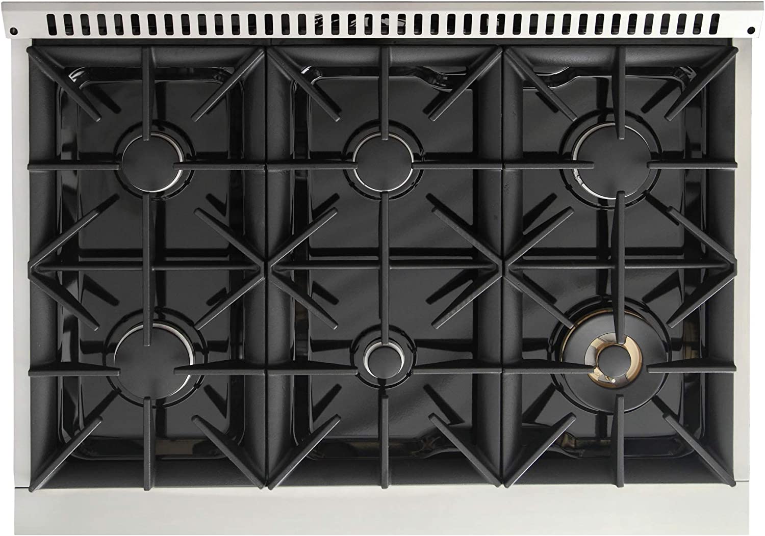 Six-burner grates layout with black burner caps on stainless cooktop