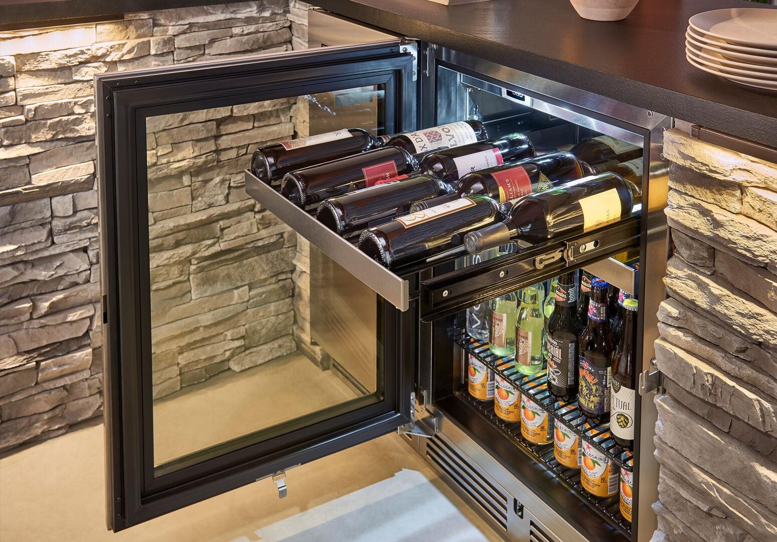 Perlick built-in beverage center with open glass door and bottle storage shelves